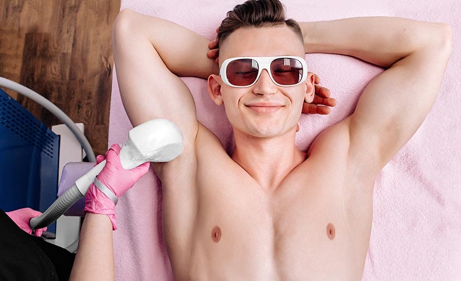 A young man getting a laser hair removal​